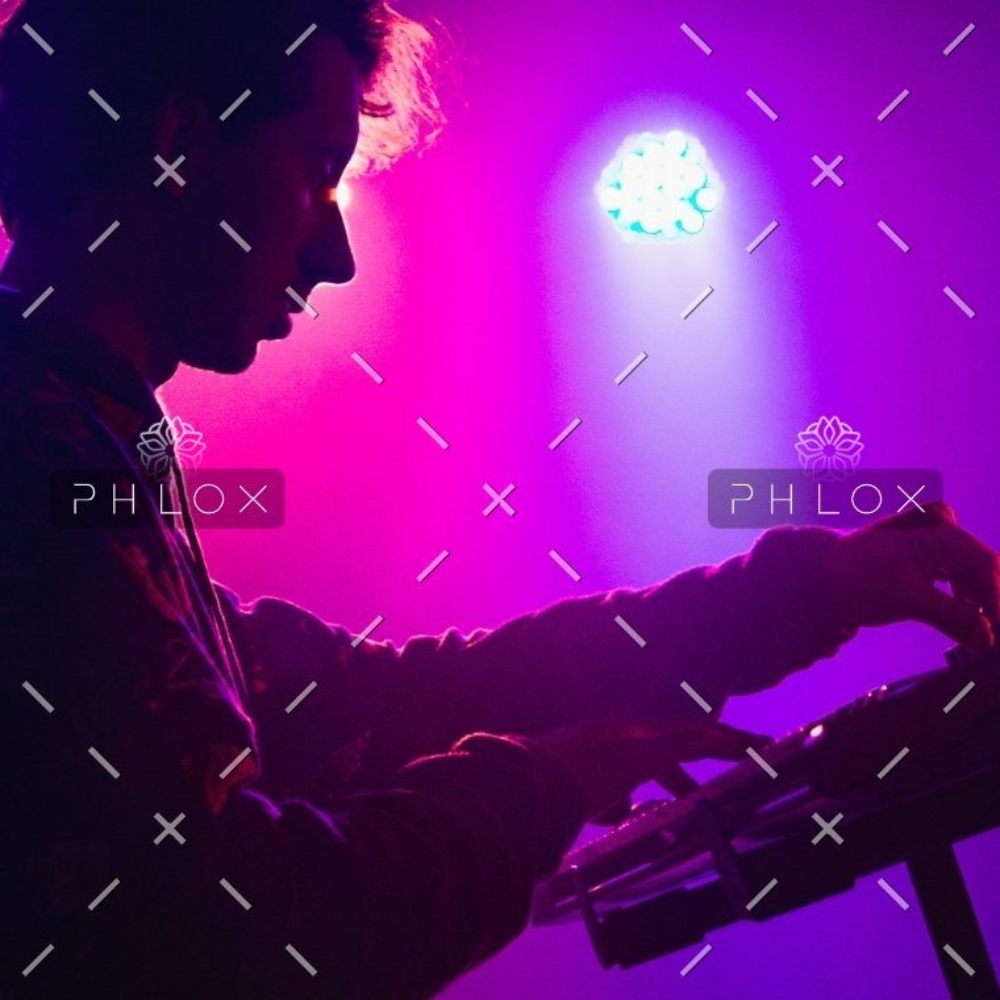 demo-attachment-30-man-holding-dj-mixer-machine-2350325